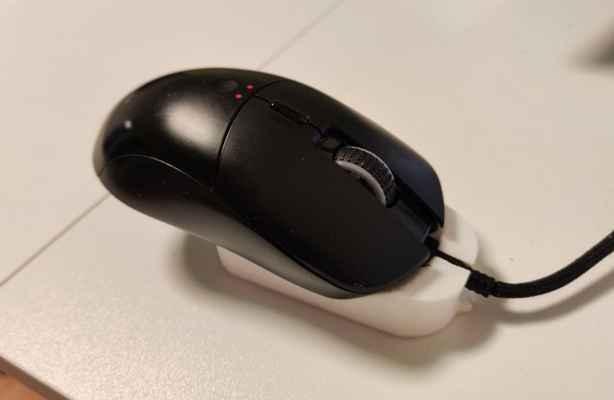 Wireless mouse charging dock (Trust GXT 980 Redex)