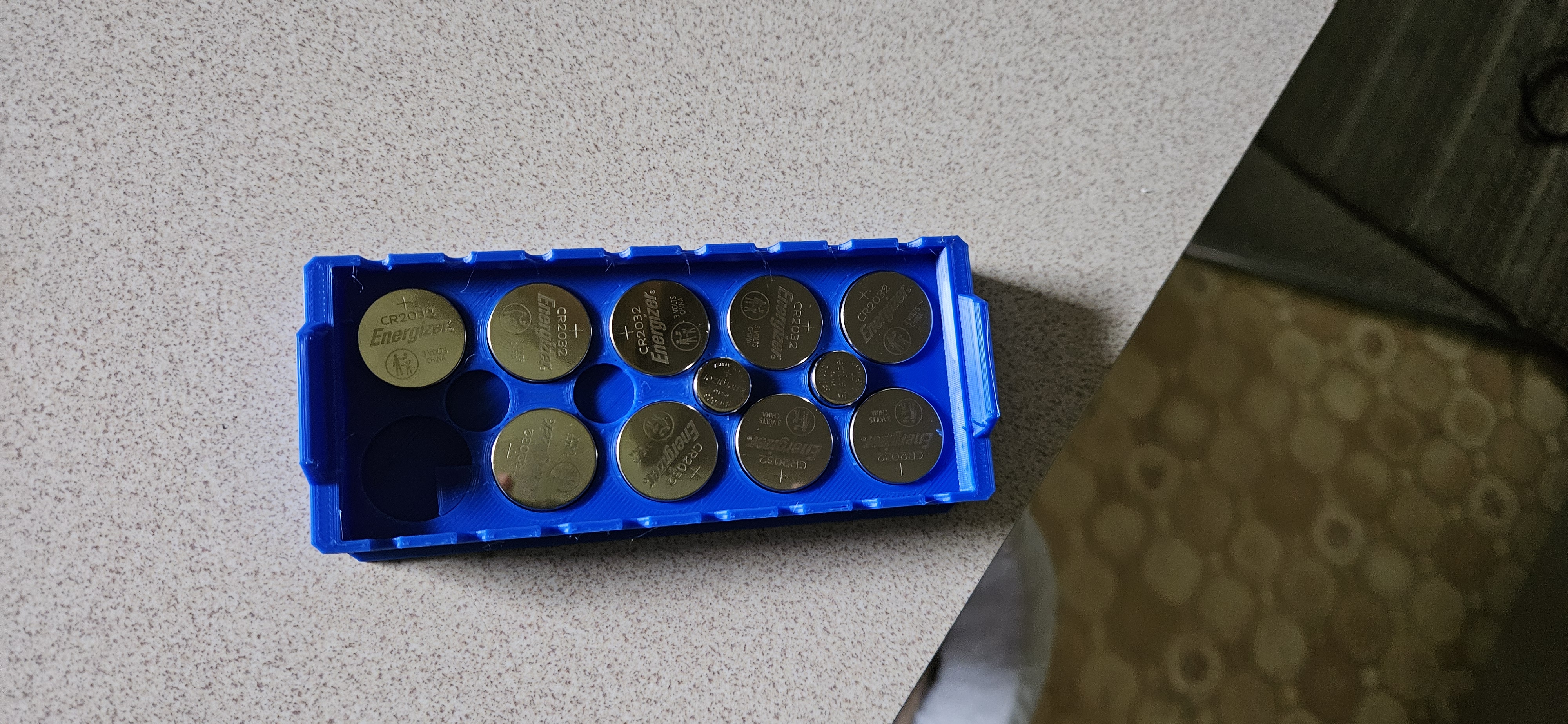 Stackable button cell battery holder