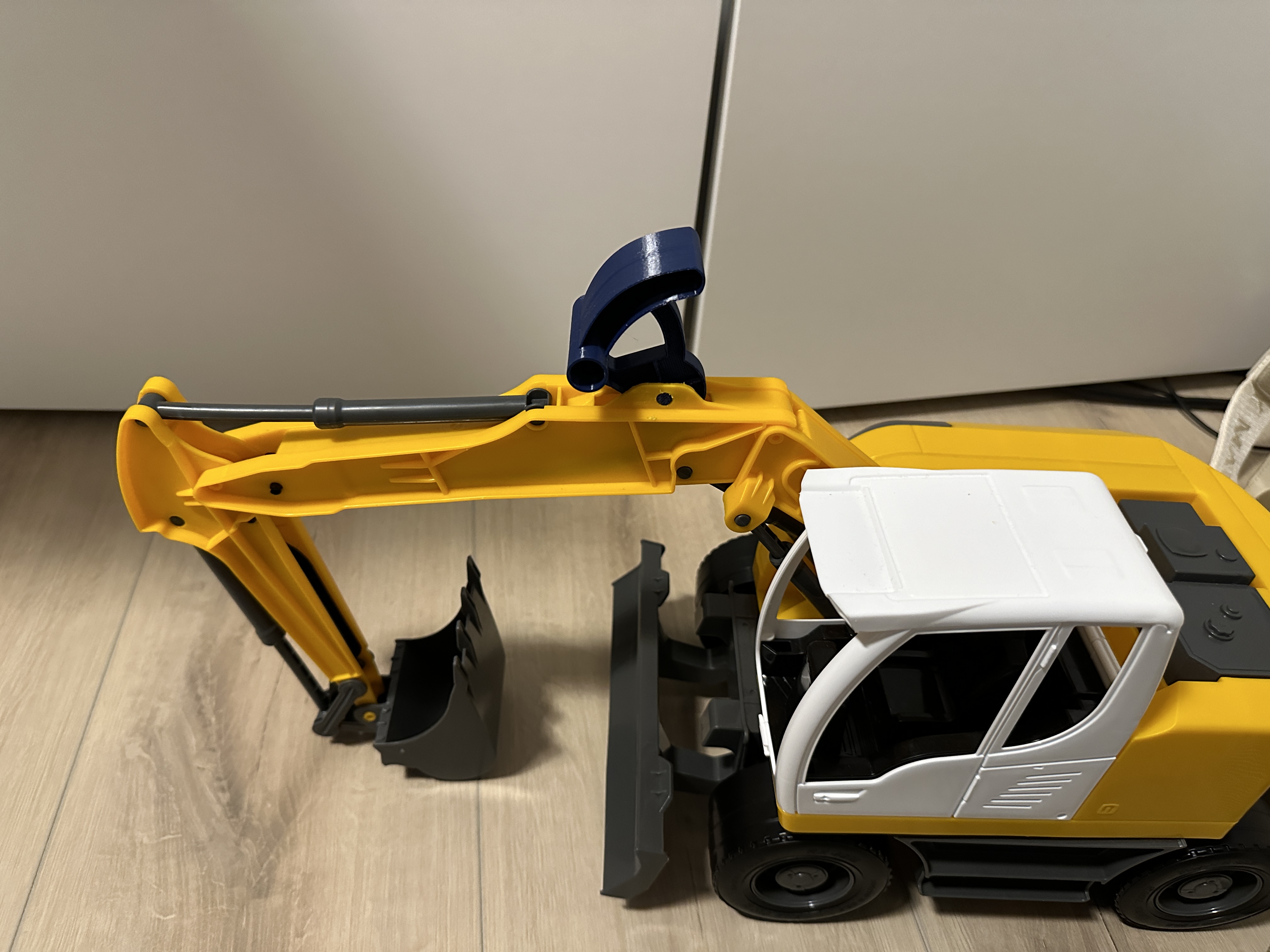 Lever for children's excavator toy