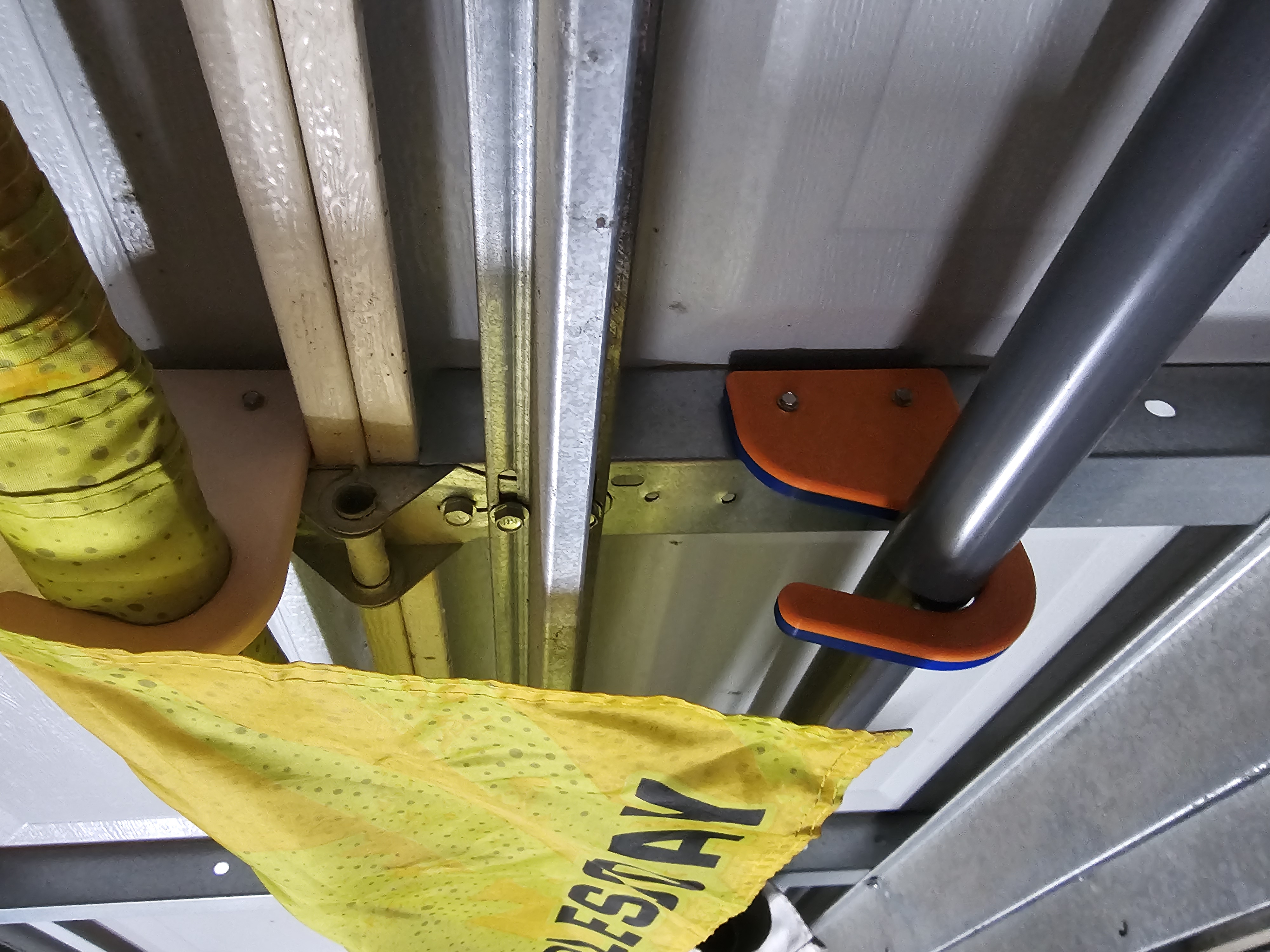 Fishing/Flag Pole Garage Door Holder