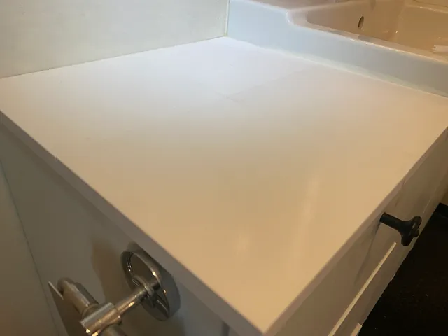 Bathroom cabinet top repair