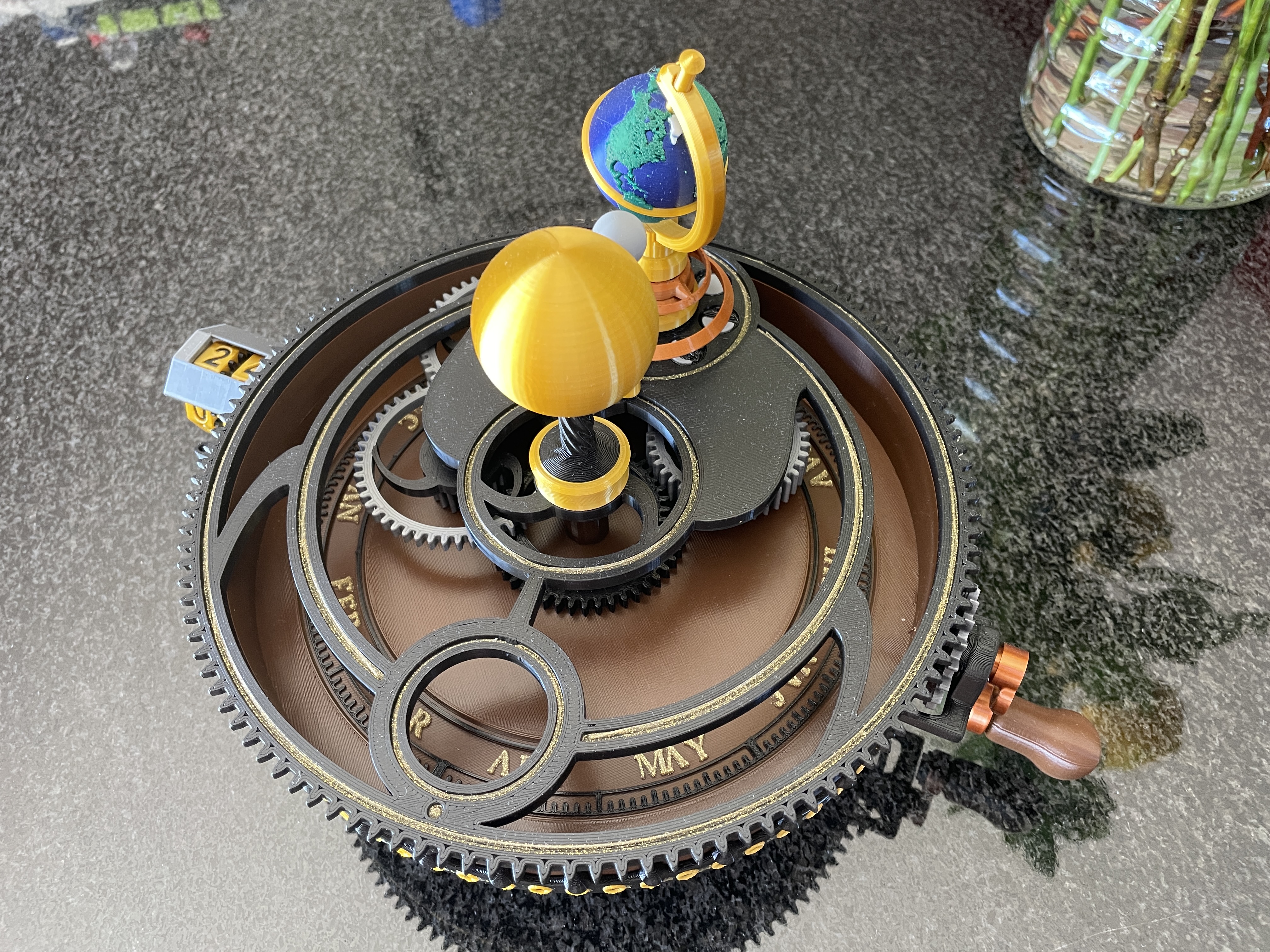 Orrery with editable month text and color-coded earth and other parts