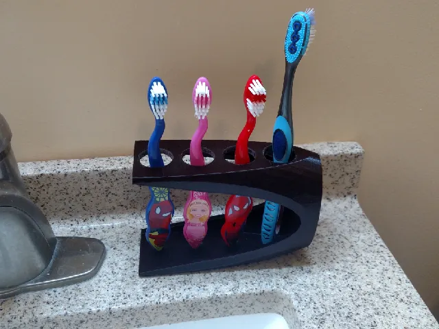 Tooth brush/paste holder