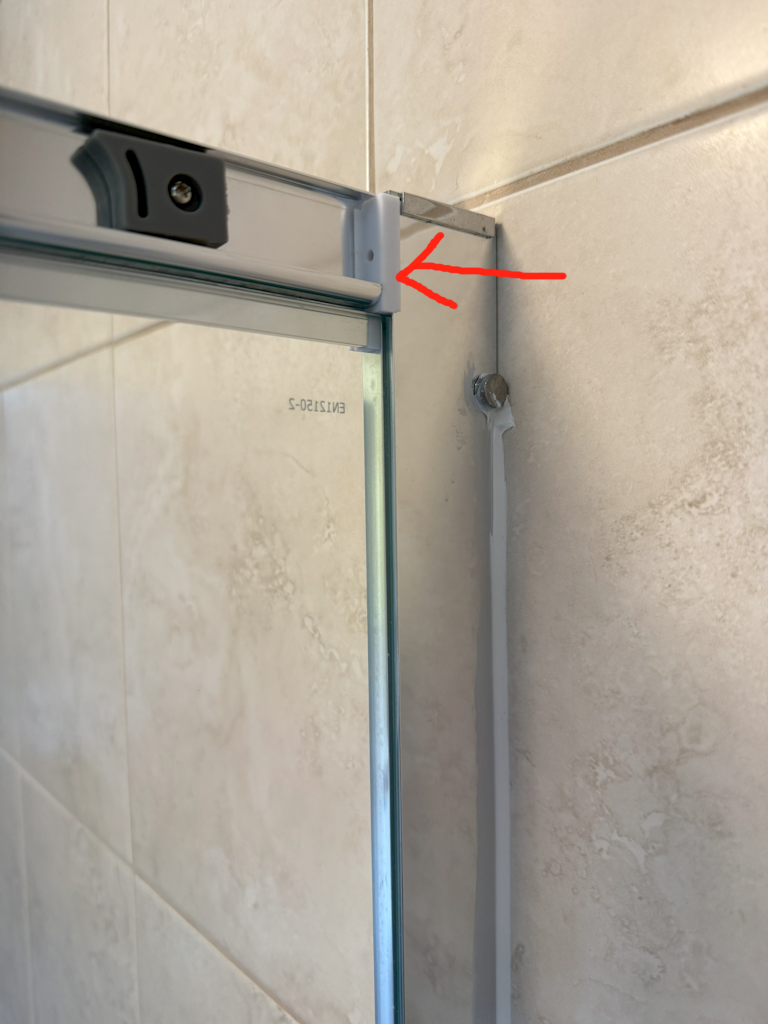 Shower enclosure bracket