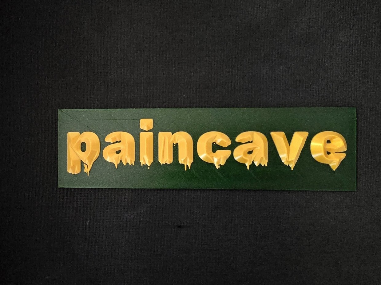 paincave room sign