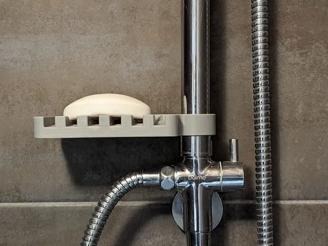 Shower rod soap dish