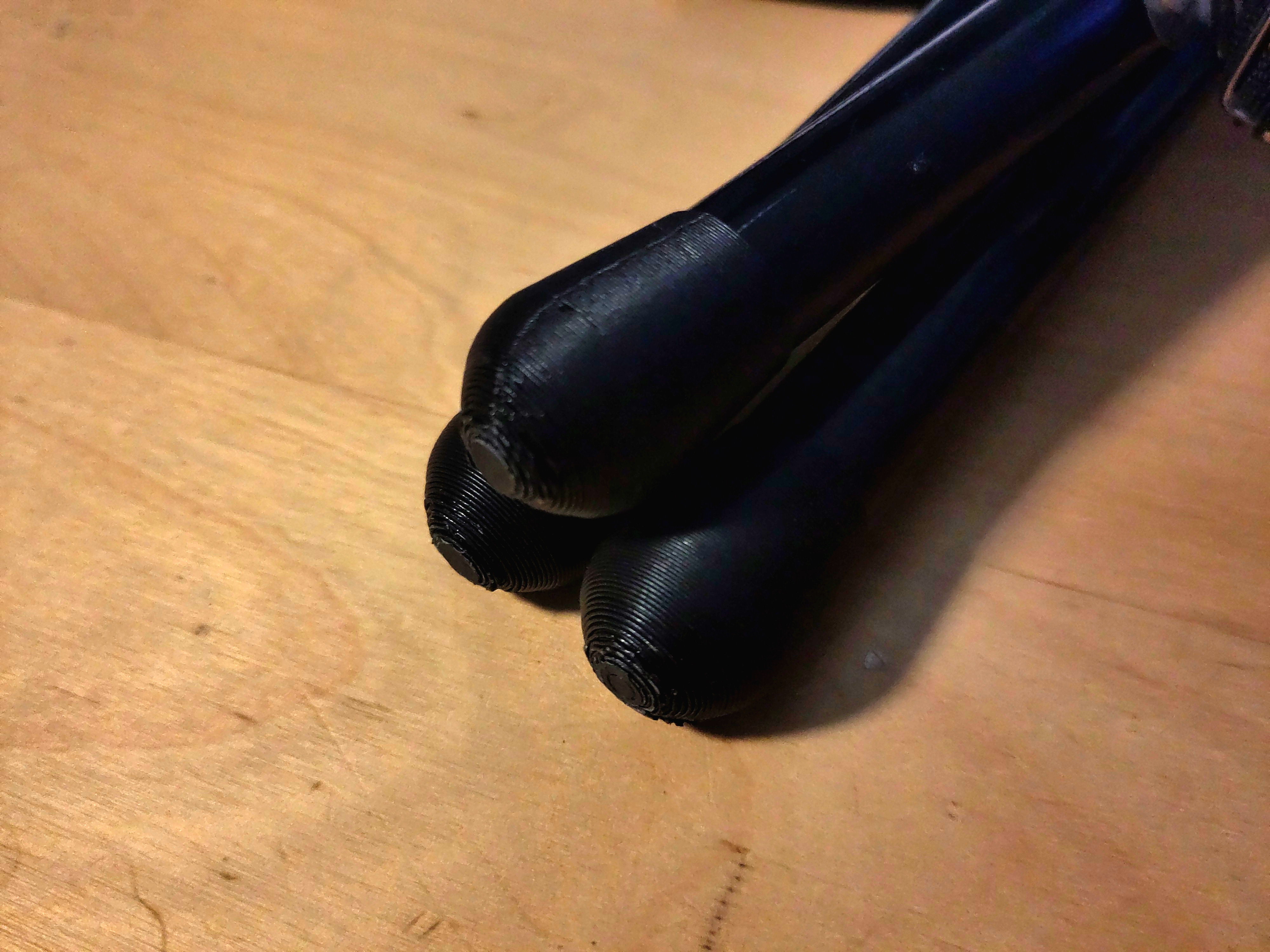 Tripod camping stool feet