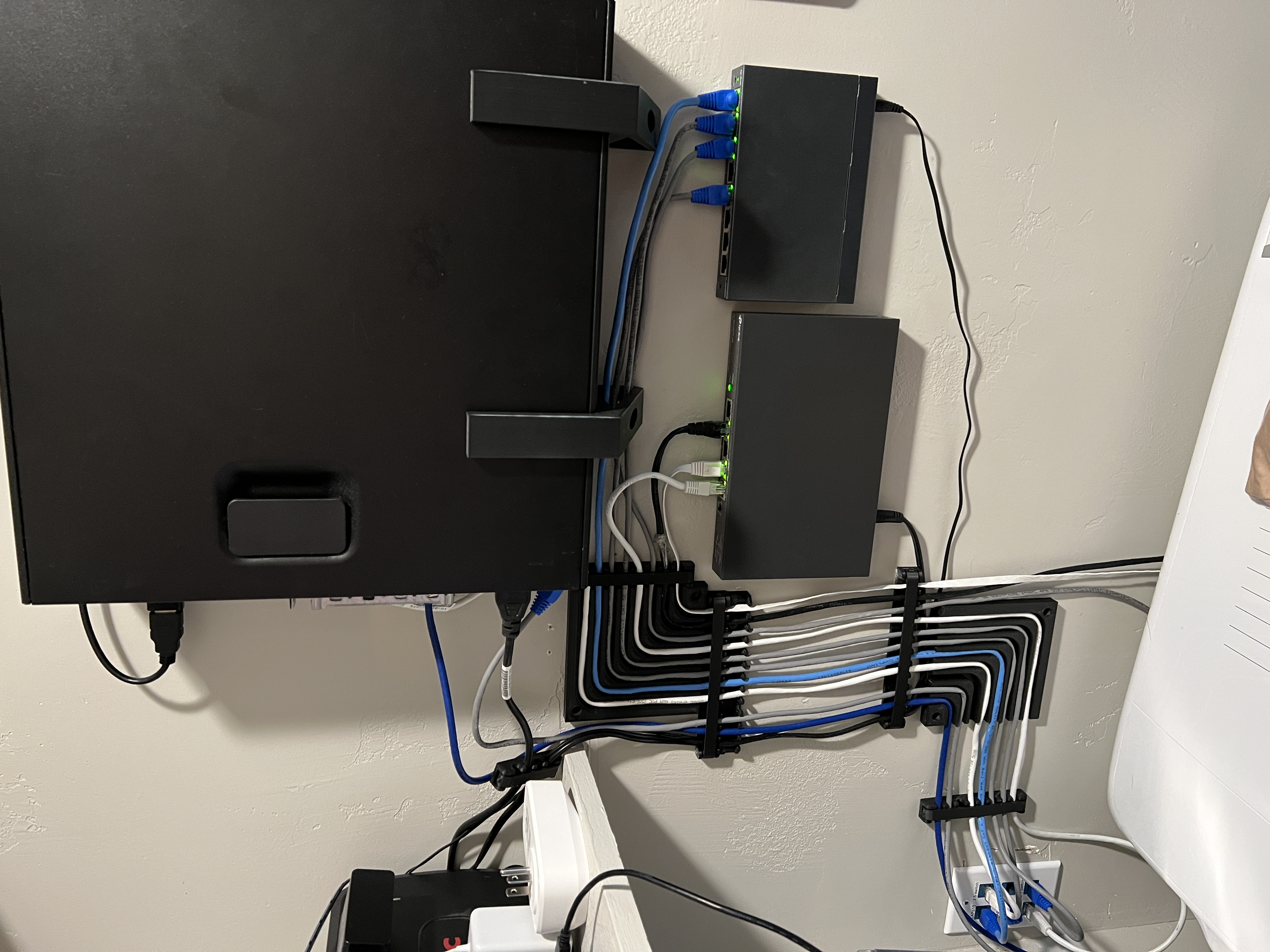 Wall mounted cable track for 8 ethernet cables