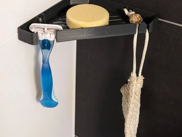Shower corner shelf for soap and razor