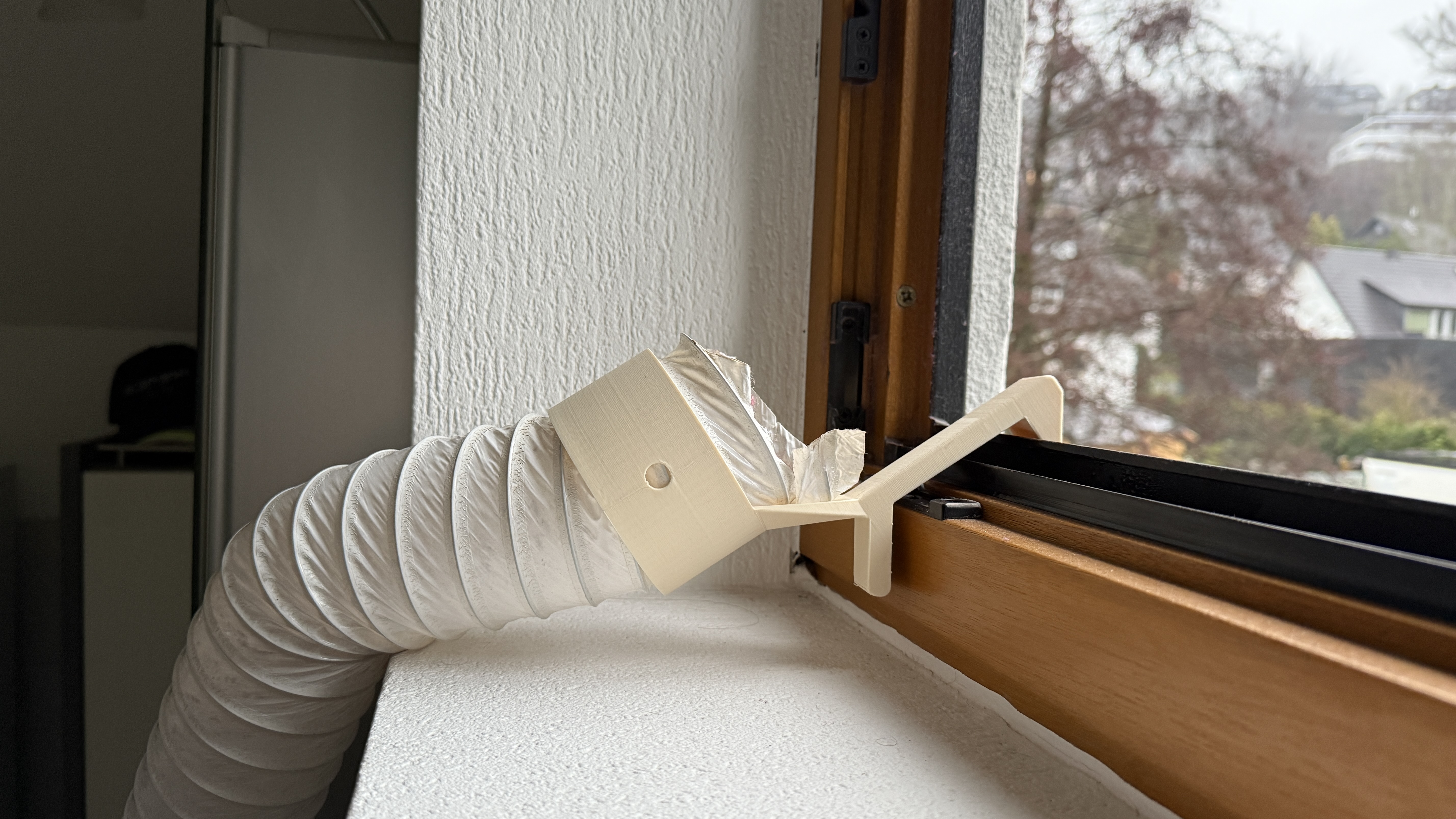 Halter Wäschetrockner Abluftschlauch für Fensterrahmen