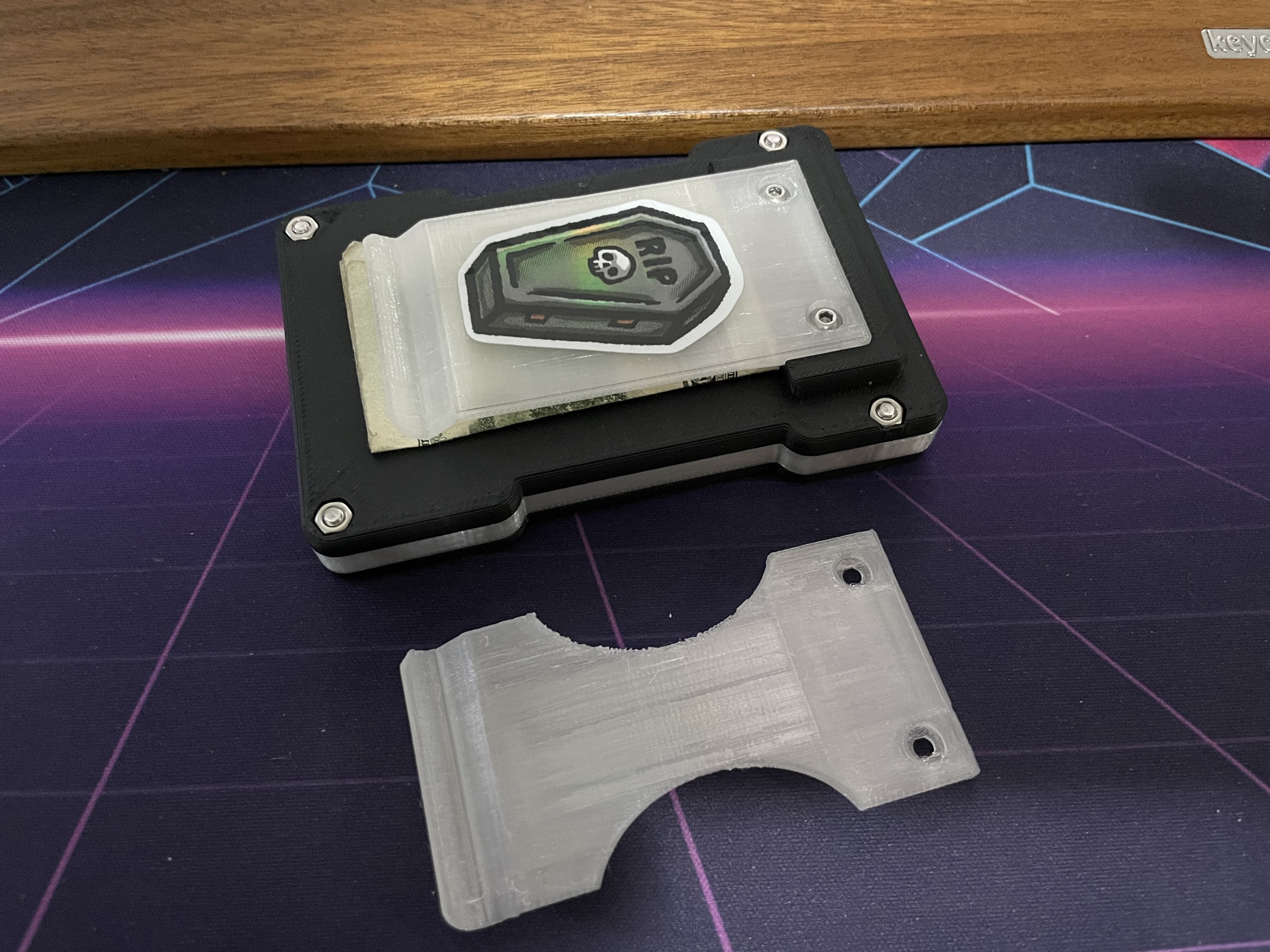 Pop-up credit card wallet spreader with money clip