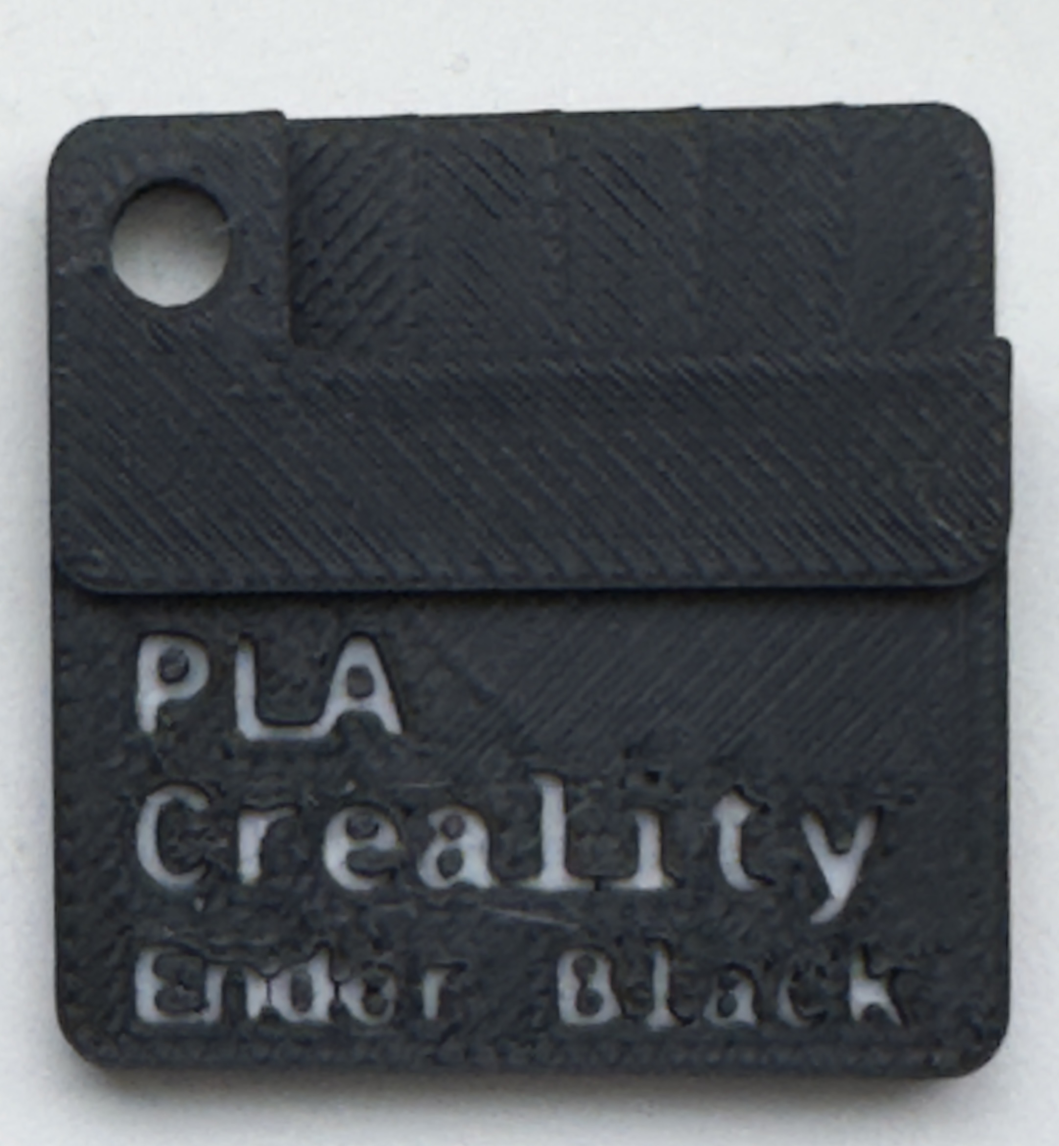 Material swatch, three lines, with inlayed text