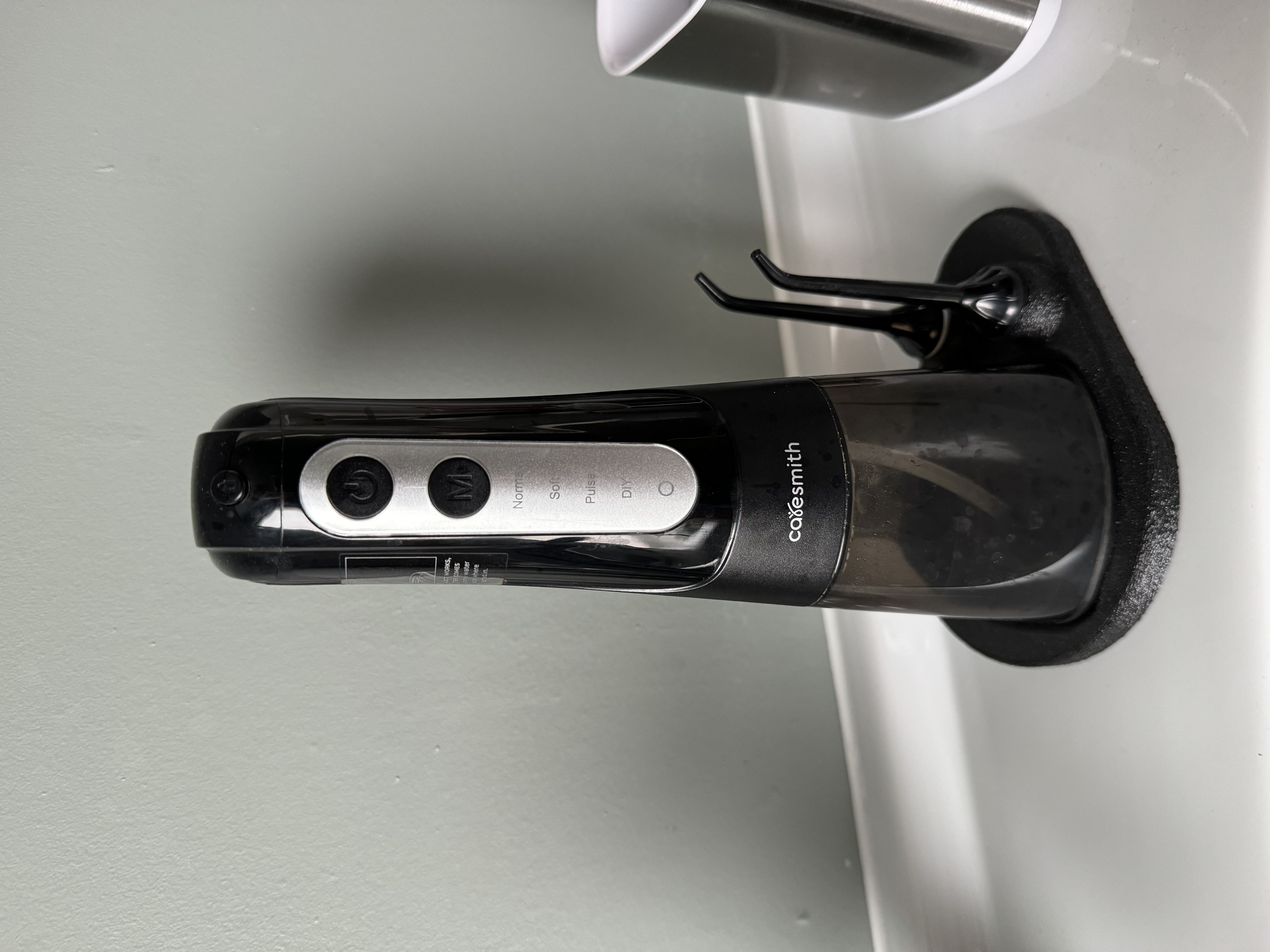 Water flosser base