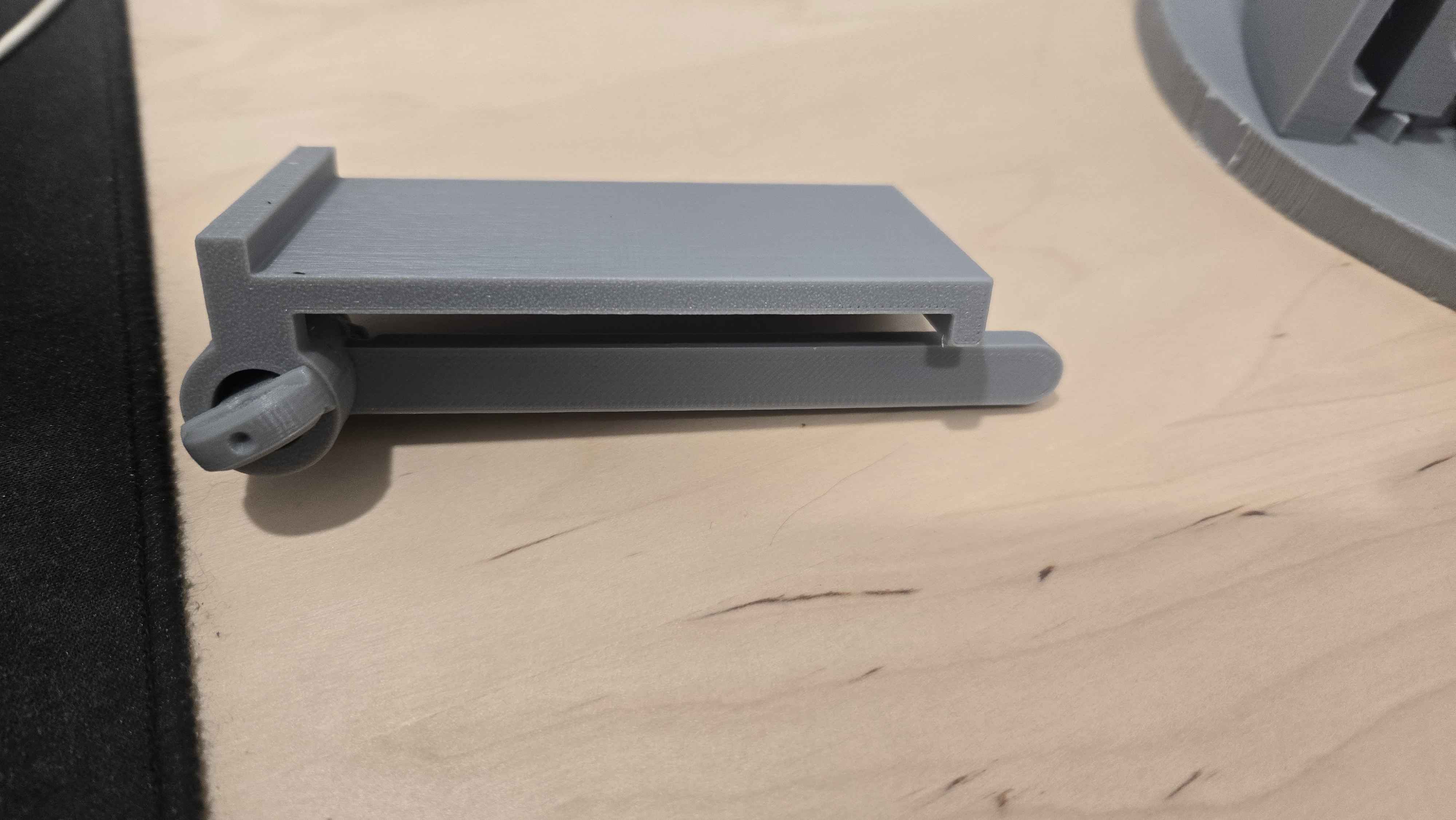 Headphone holder for back of monitor