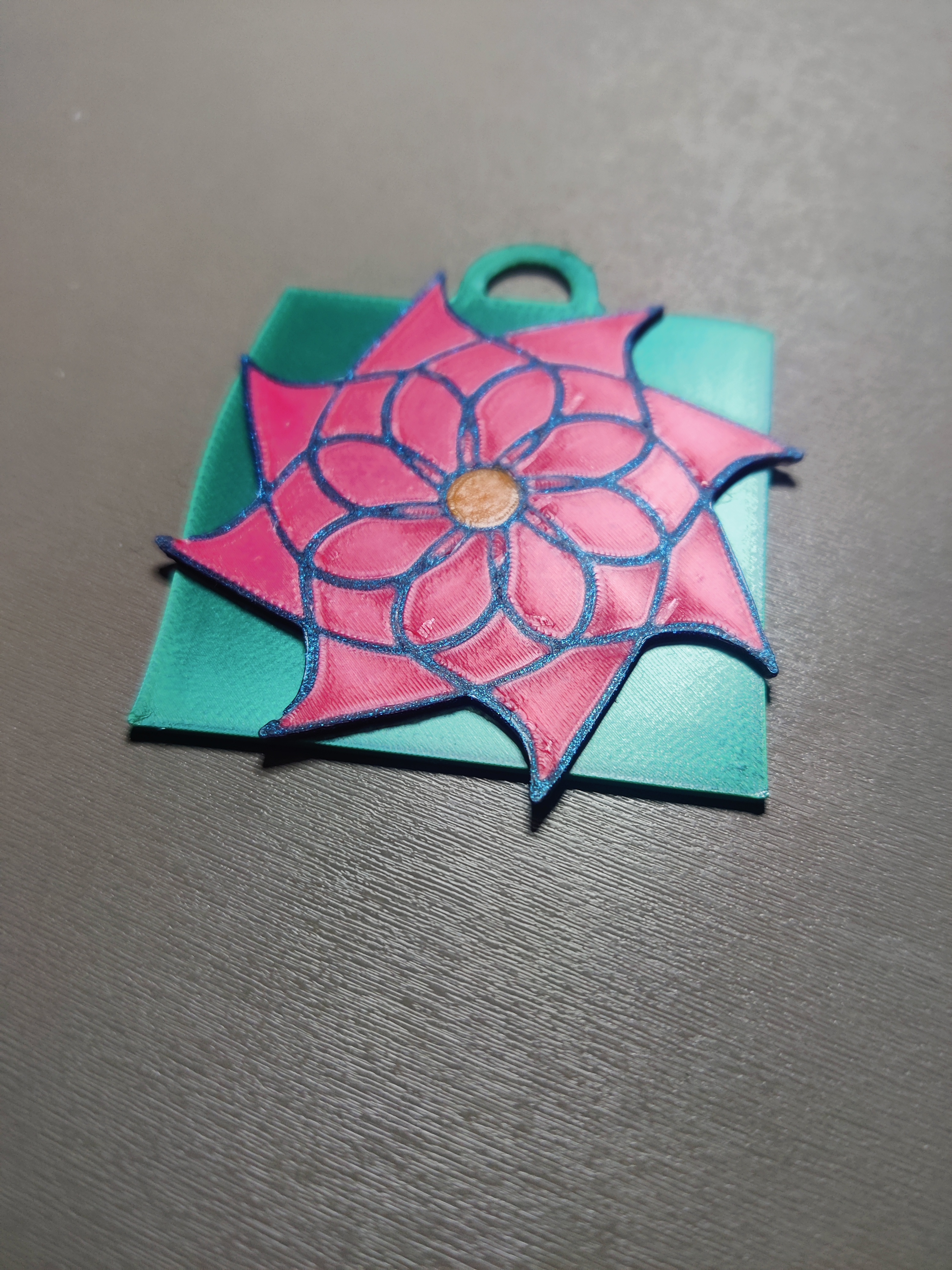 Flower from Flower, Sun, and Rain logo