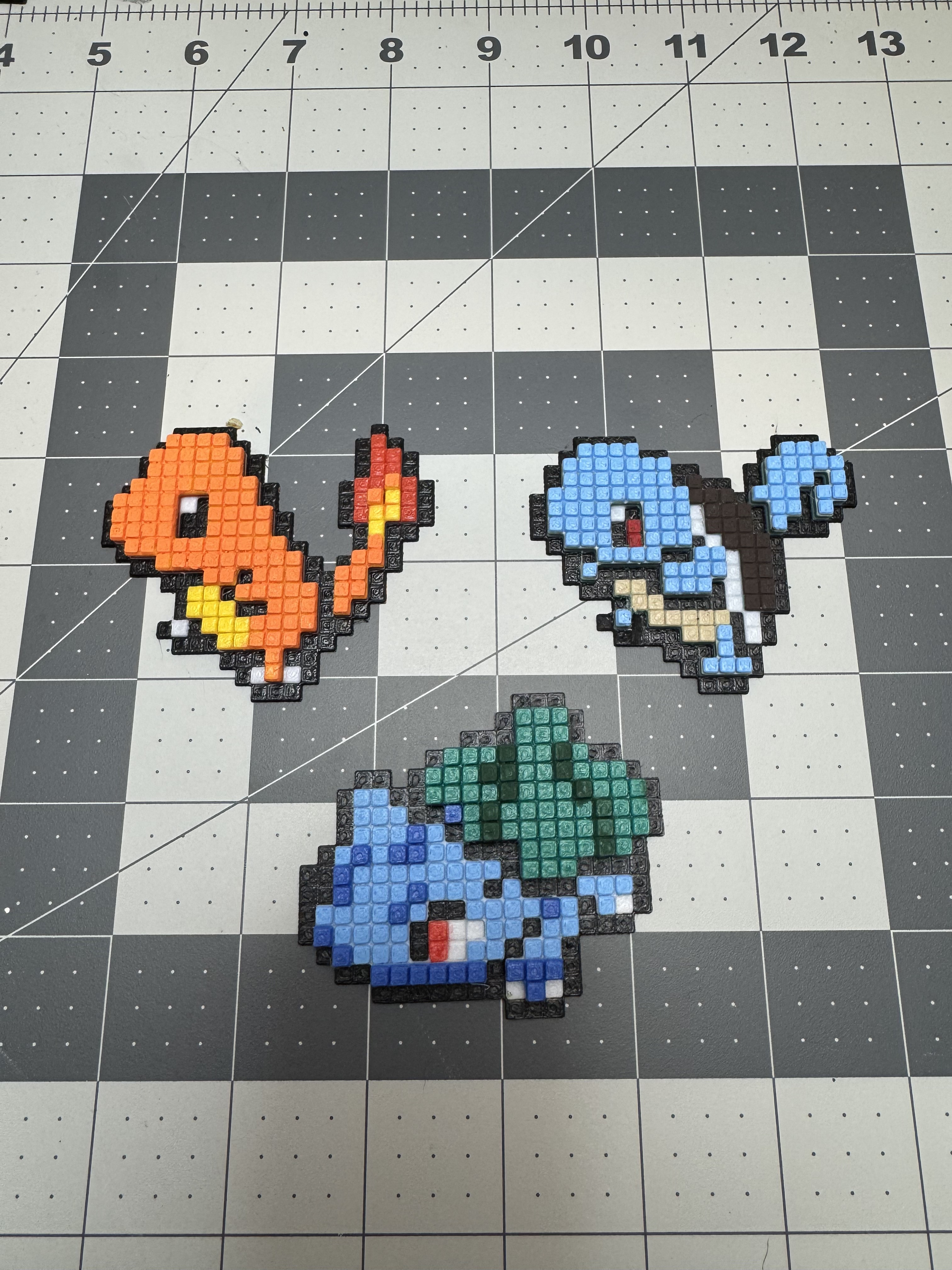 Charmander Squirtle and Bulbasaur Pixel Art