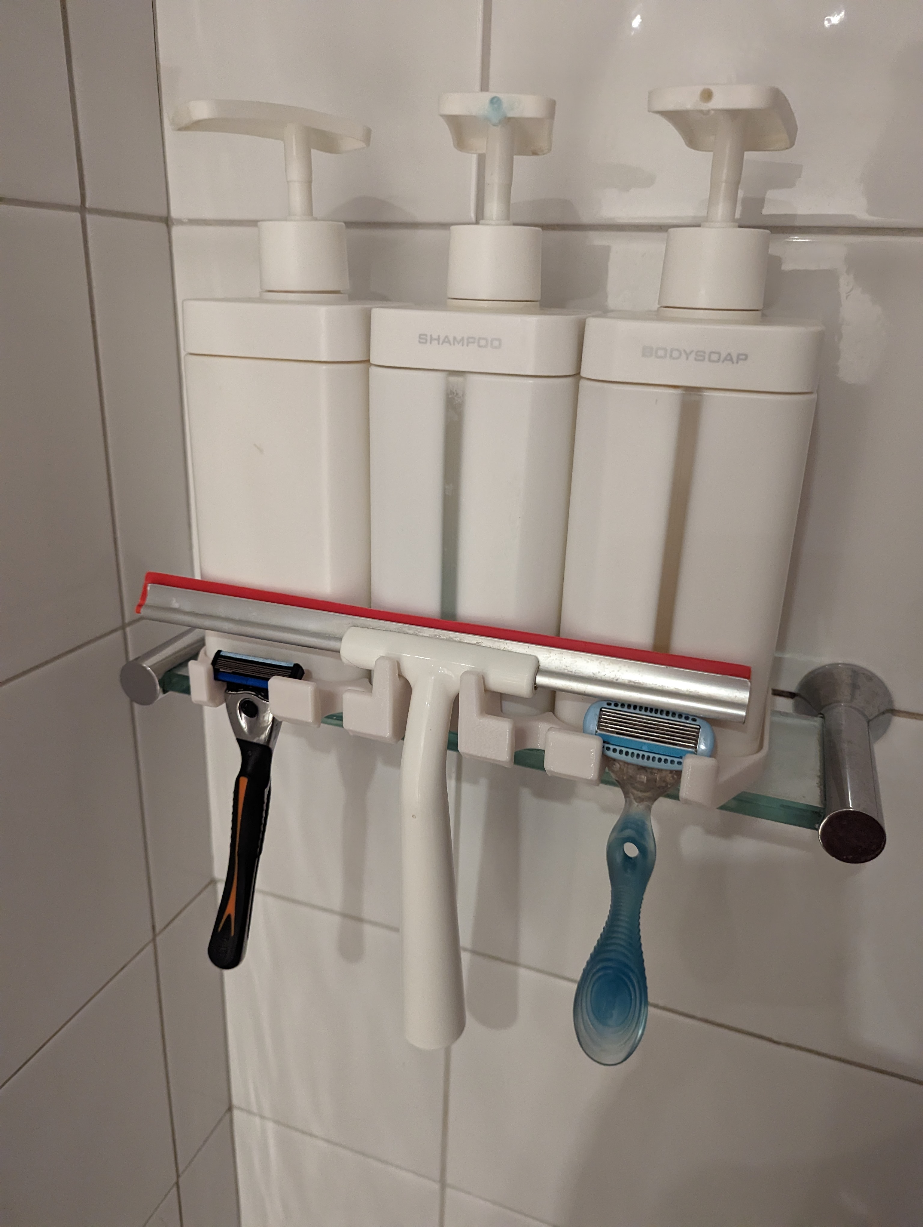 Triple soap/shampoo/conditioner  dispenser and Ikea squeegee razor holder caddy thingo