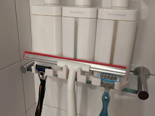Triple soap/shampoo/conditioner  dispenser and Ikea squeegee razor holder caddy thingo