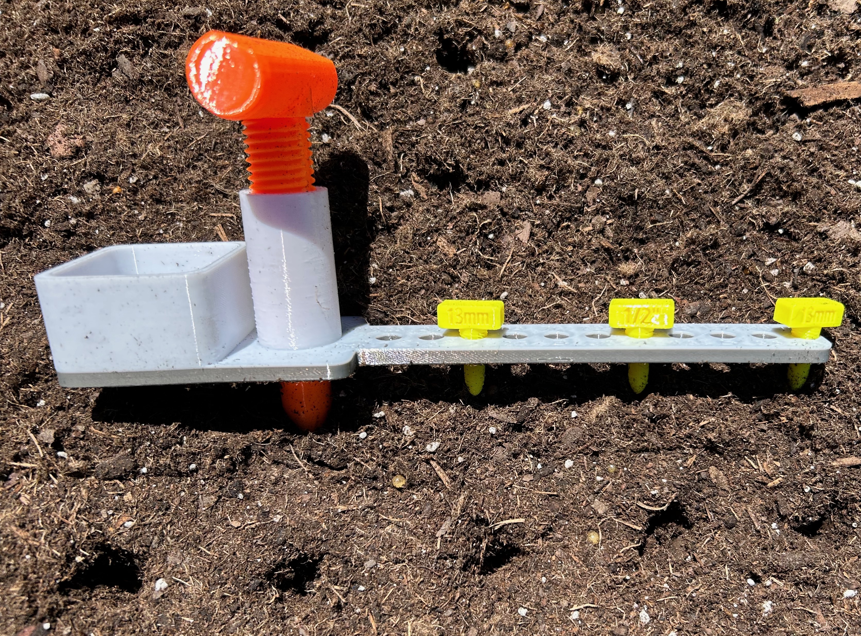 Distance and Depth Seed Planting Jig
