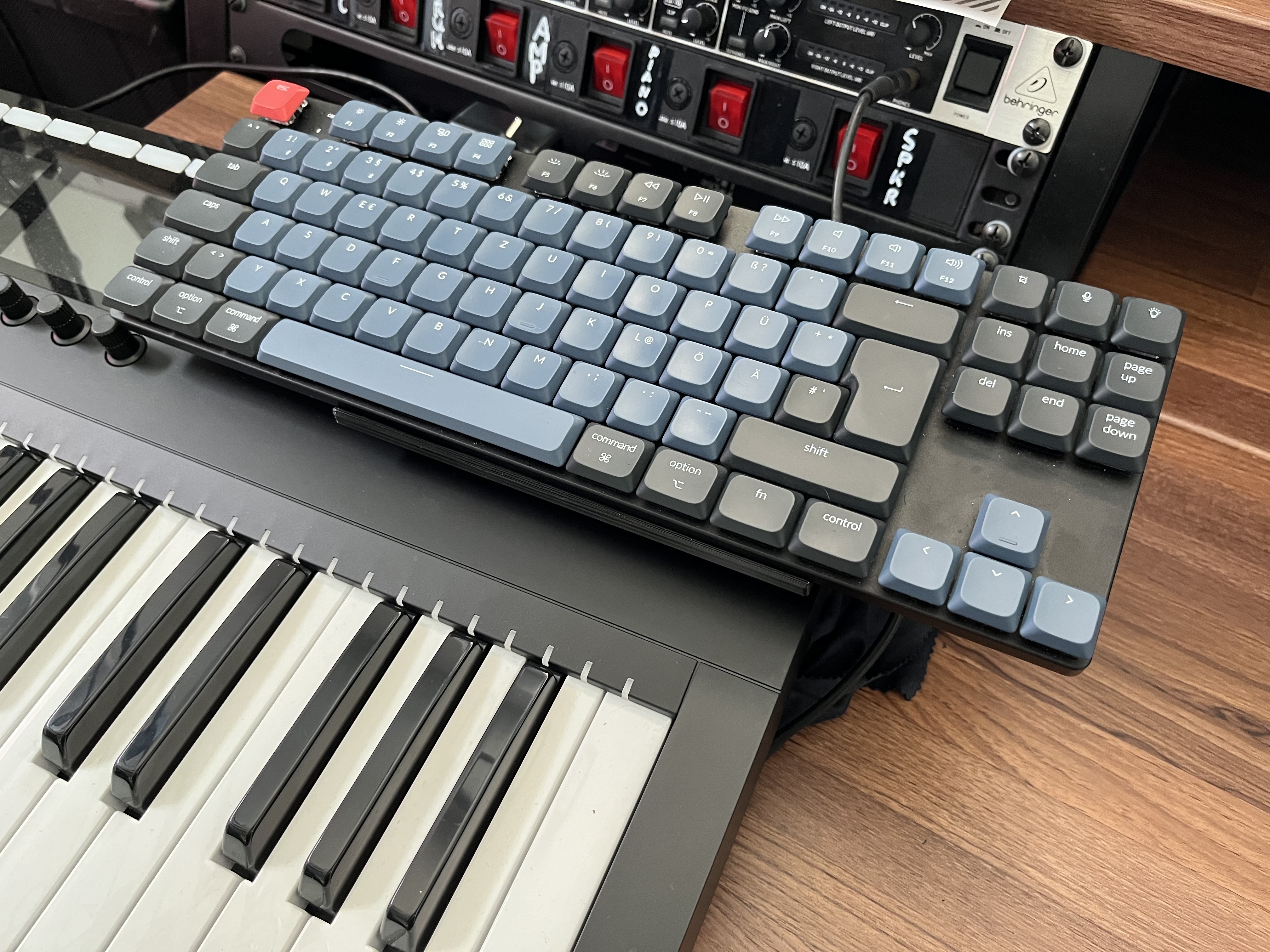 Put your keyboard on a keyboard (or something else)