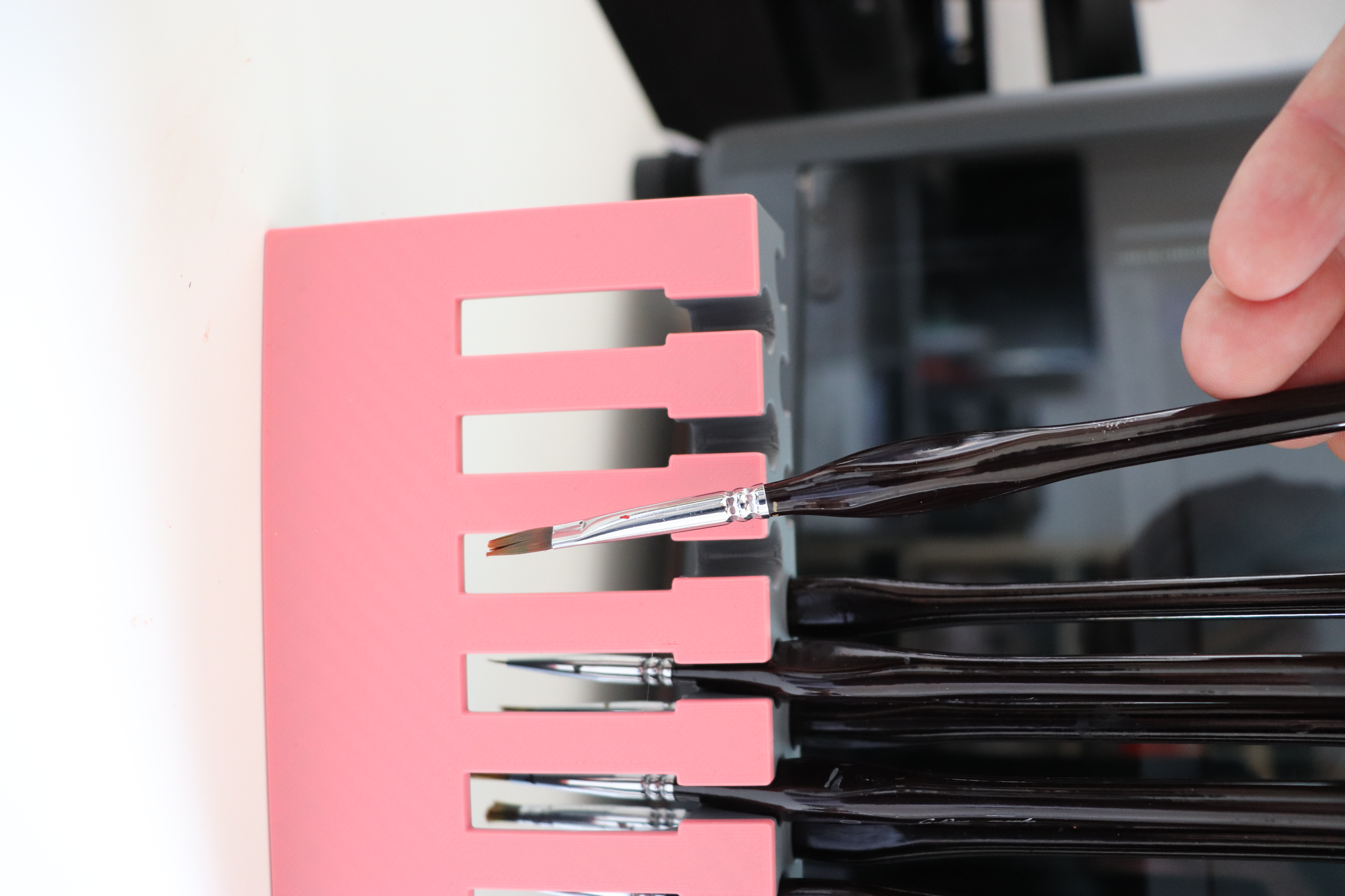 brush holder for ergonomic triangular handle
