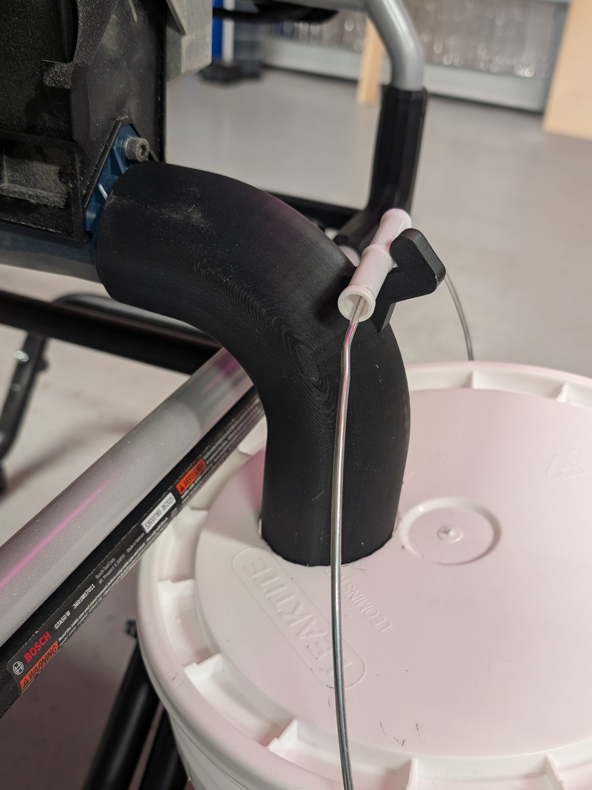 Parametric table saw dust collection tube