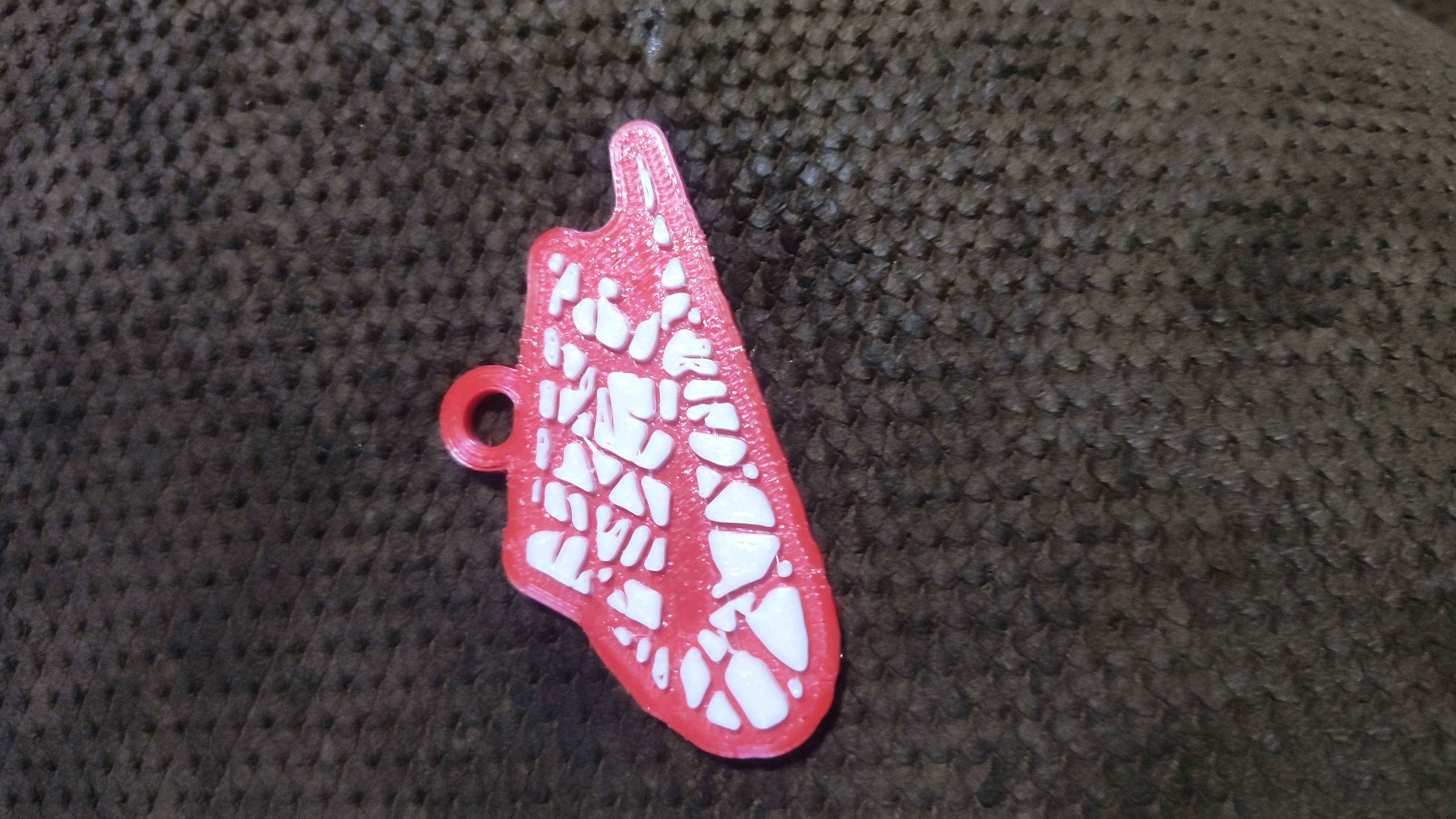 cracked nike charm