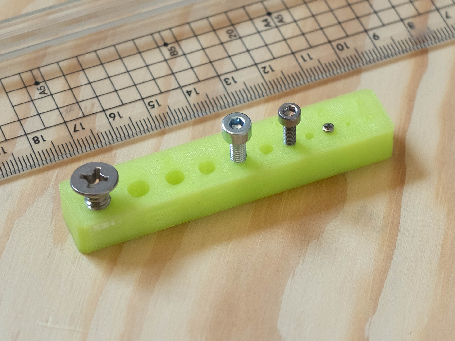 'Screw tester' simple bench with holes.
