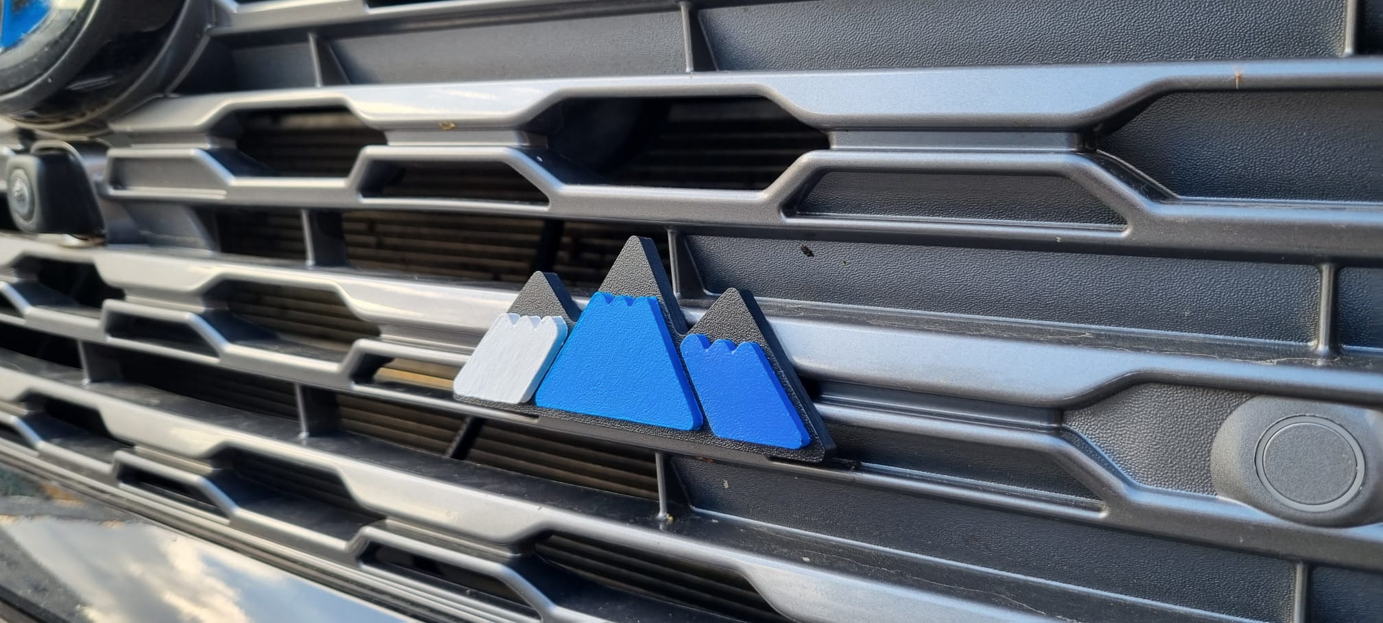Toyota mountain grille badge