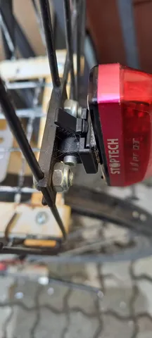 Bike light basket mount