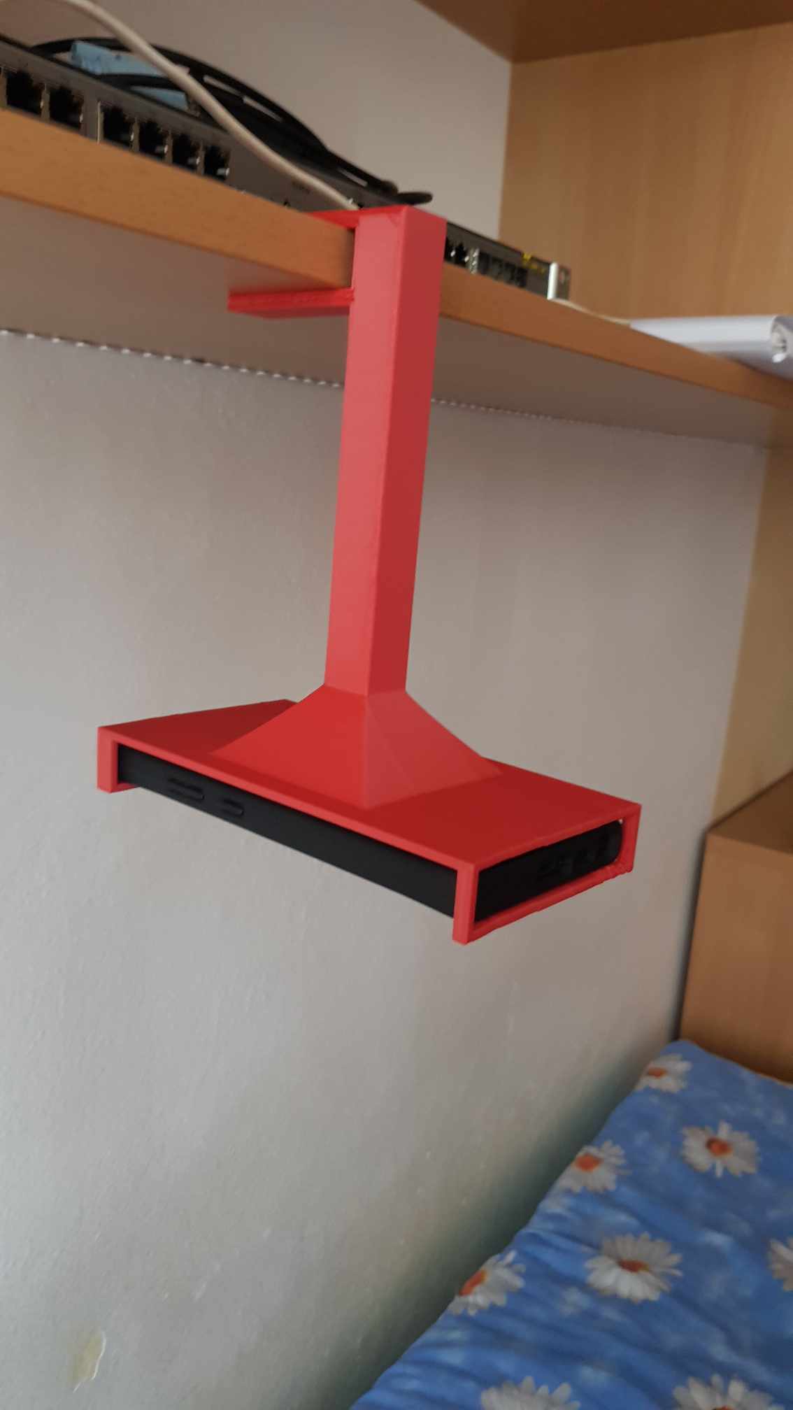 Shelf phone holder
