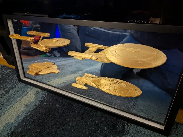 Star Trek display of Enterprise 1, Enterprise D, Voyager, and Defiant