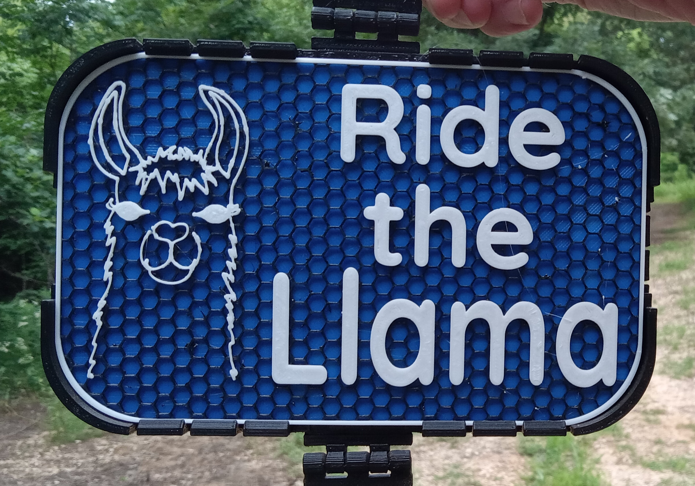Ride the Llama sign