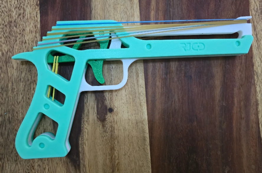 Rubber band gun, 6 shots.