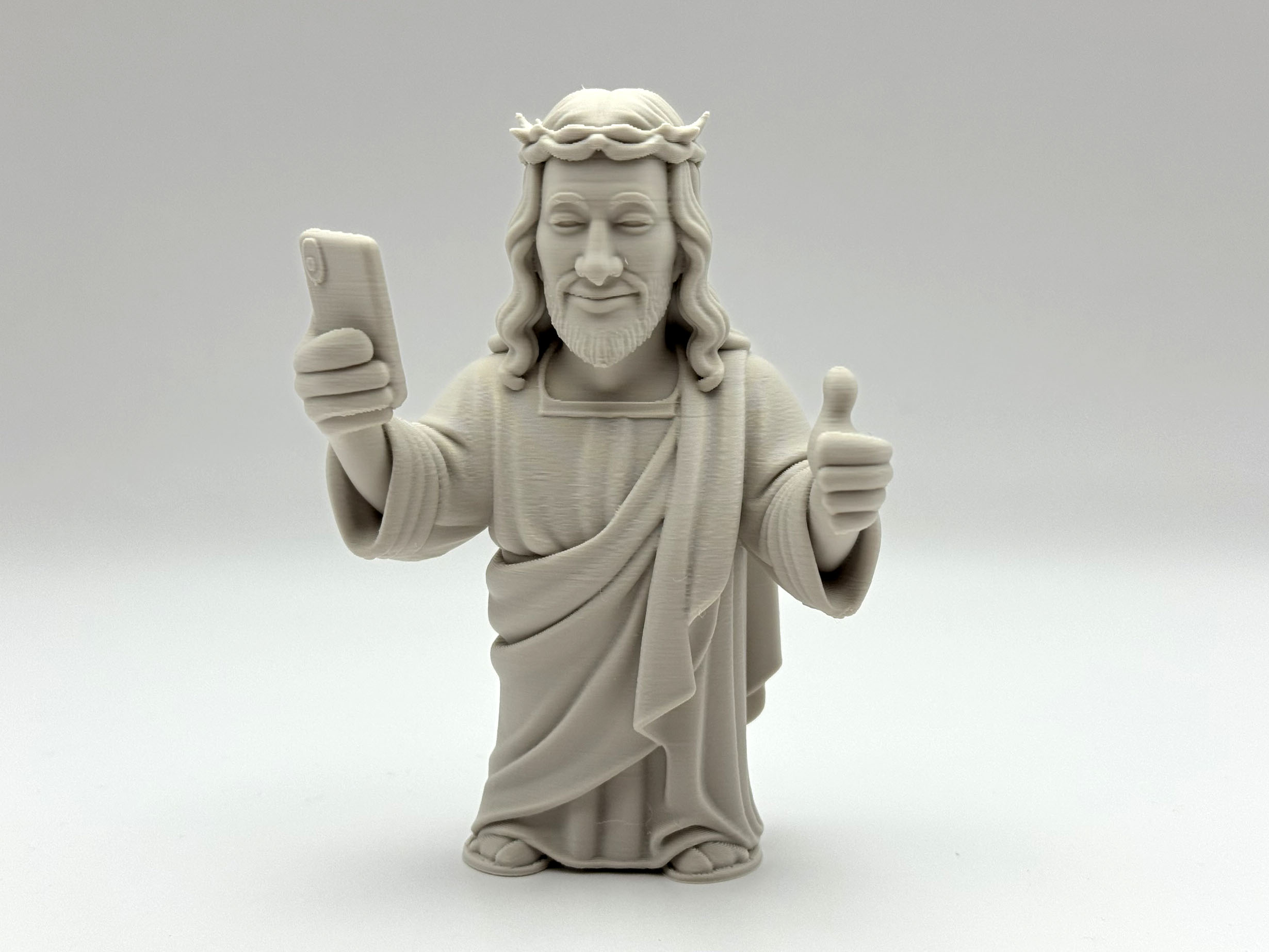Jesus Phone Figurine