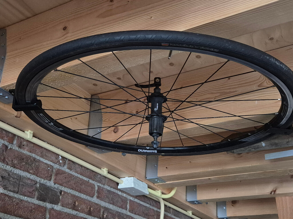 Ceiling bicycle wheel hanger hook (openSCAD, parameterized)