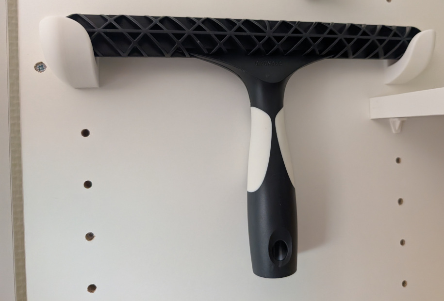 Closed corner hook for hidden mounting in 32mm European Hinge System