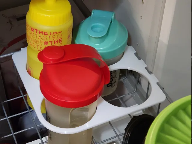 Bottle holder for wire basket