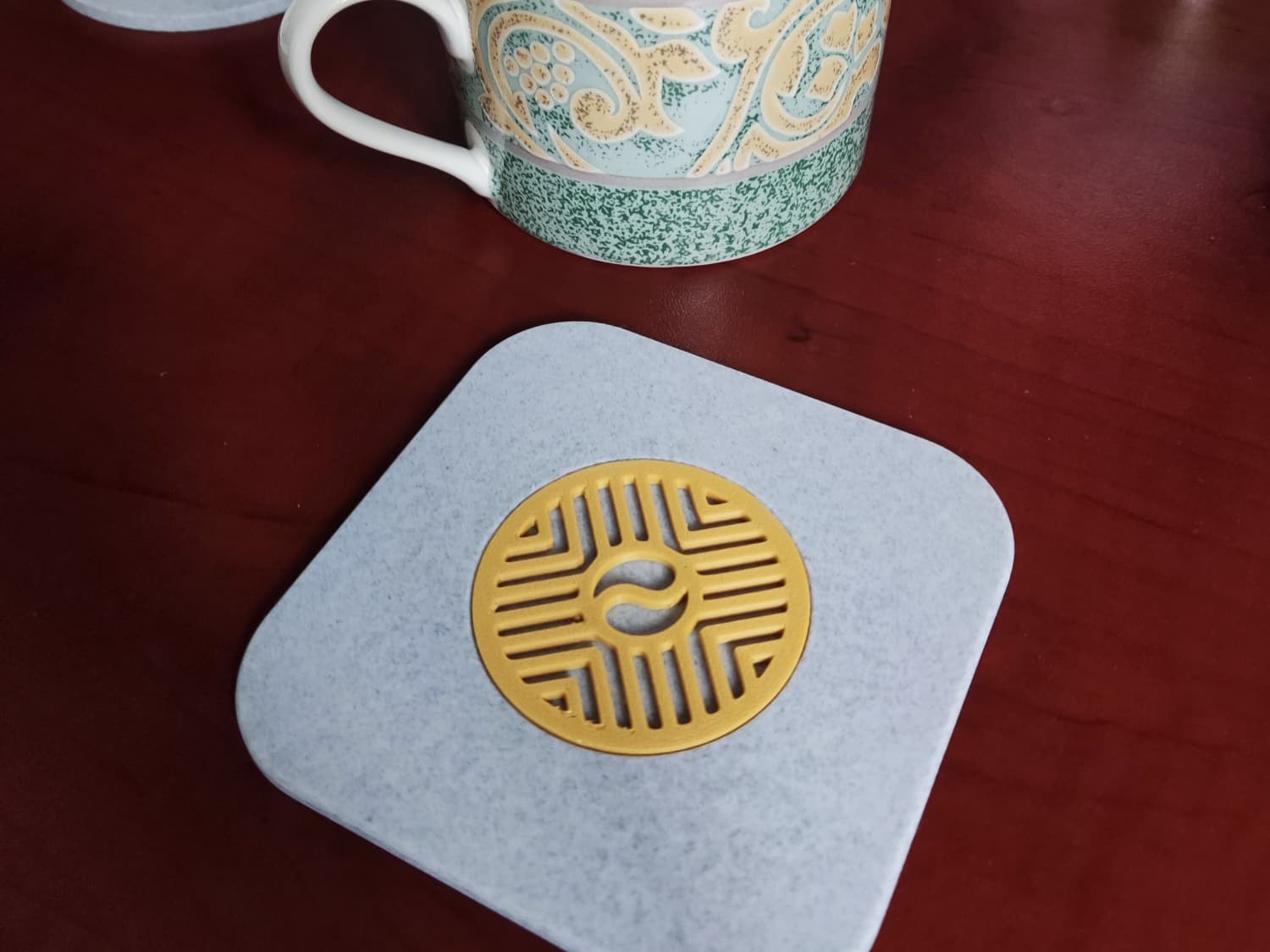 Coaster with inlay