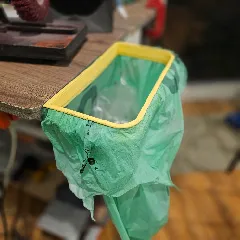 Table mounted bin