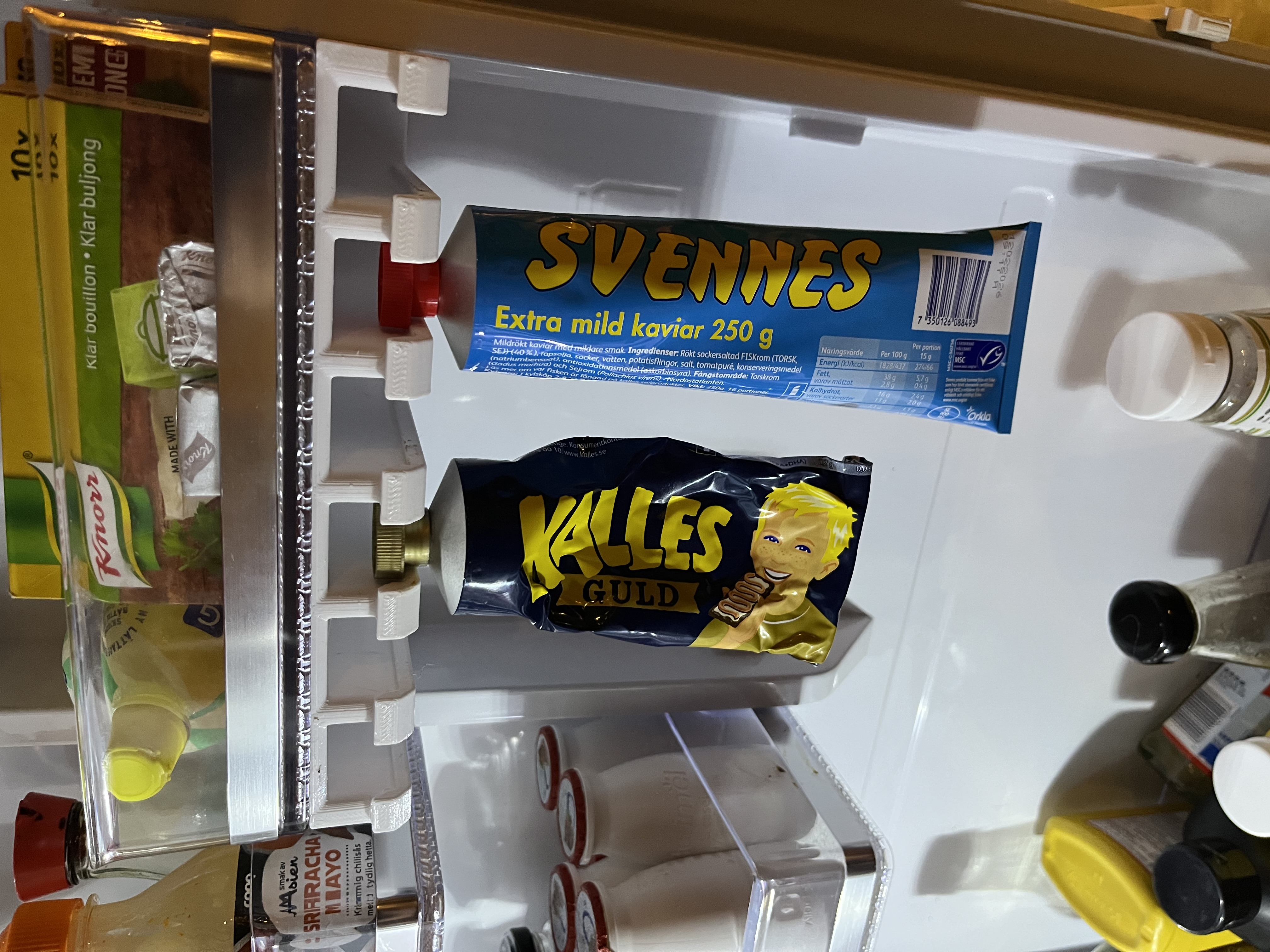 Tube holder for fridge
