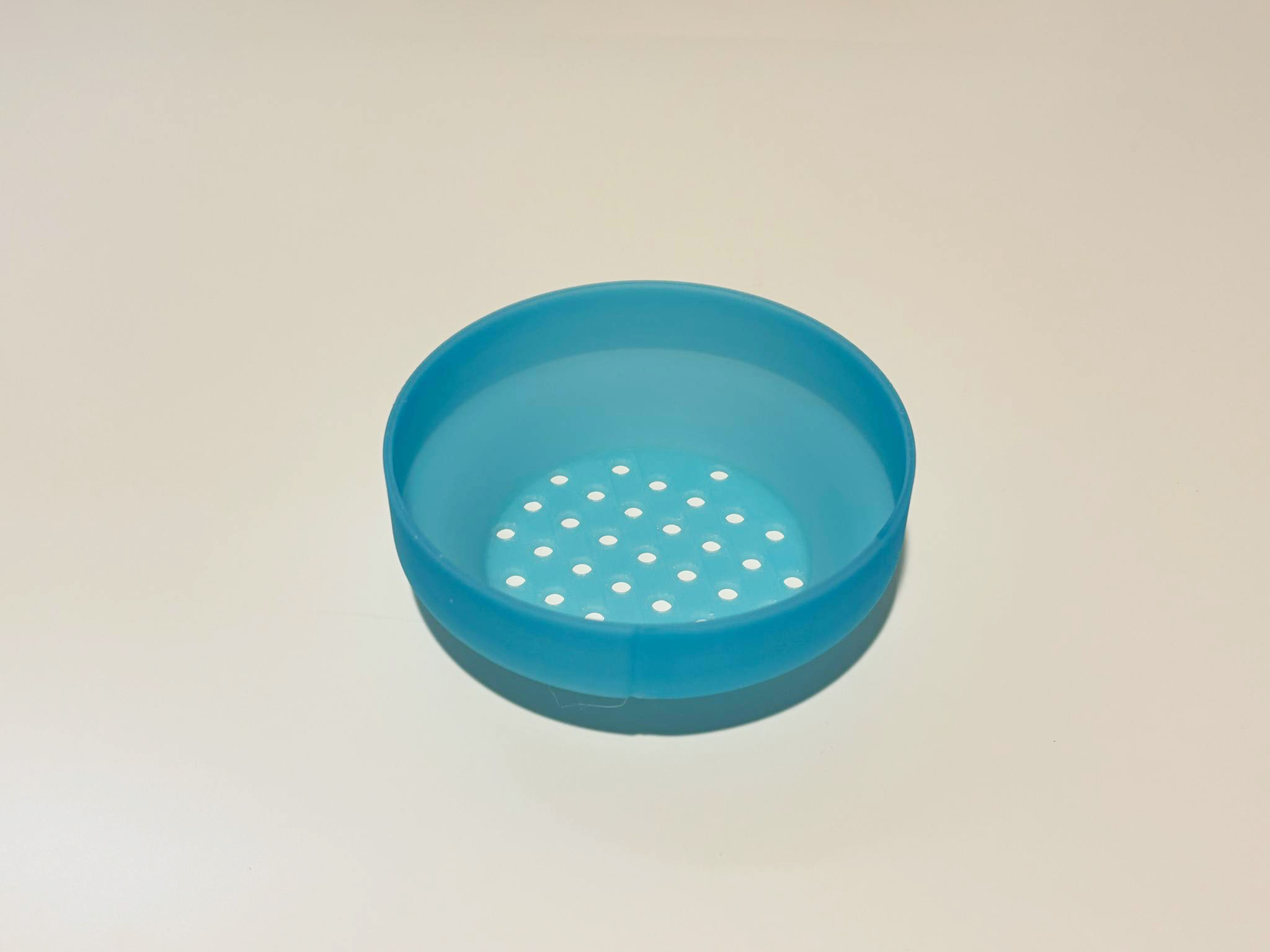 Sand sifter toy bowl