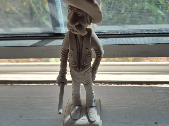 Cowboy carving 1