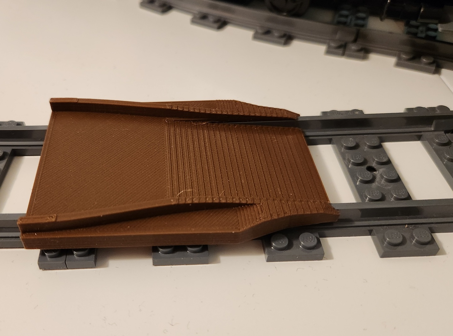 Rerailer for Lego Tracks