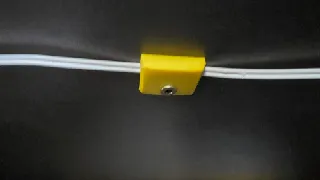 Držák drátu na vrut / Cable holder on screw (self-drilling)
