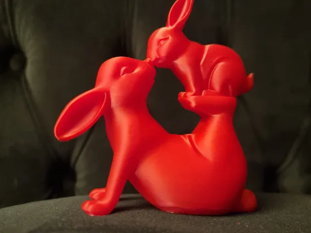 Loving Red Rabbits Sculpture