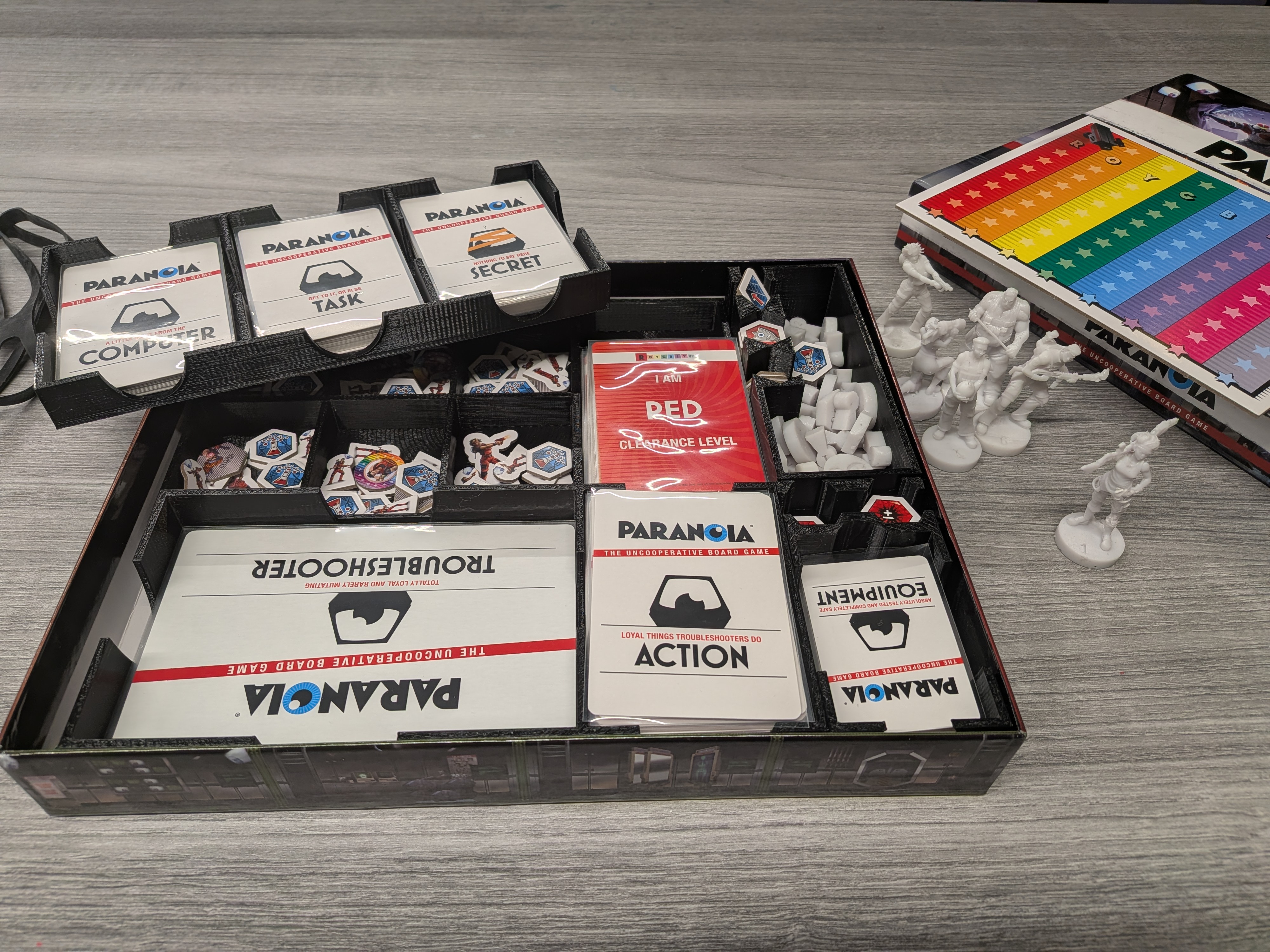Box inserts for Paranoia: The Uncooperative Board Game