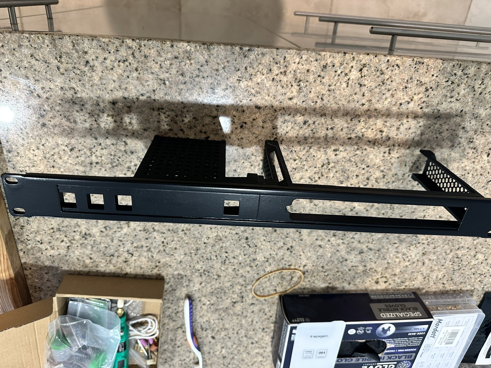 Unifi Fiber and PSU 19" rigid metal mount using brush plate.