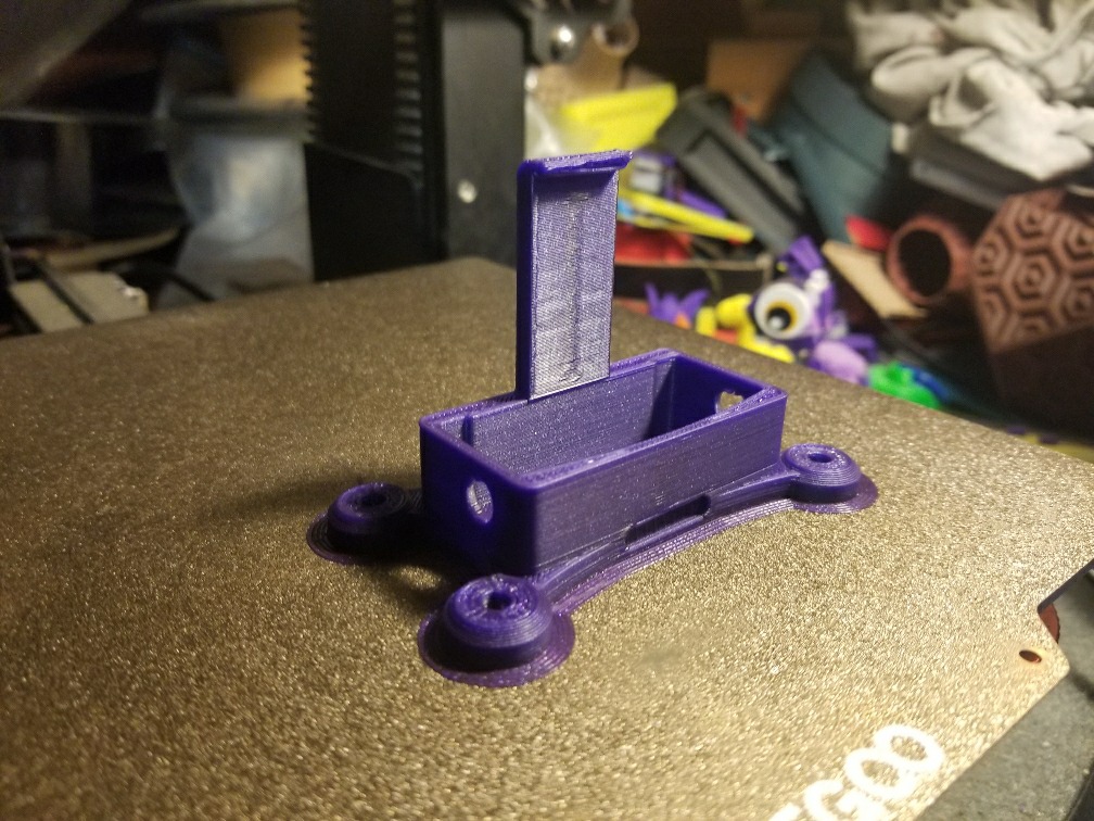 GL iNet Mango MT300N-V2 mount remix with shorter legs, mounting holes, and more!