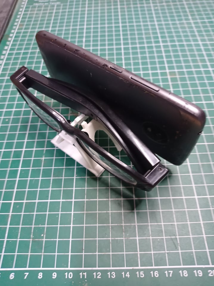 Holder for glasses and cell phone